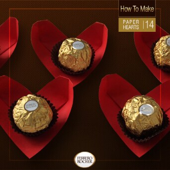 Place a Ferrero Rocher in each heart-shaped cup.
