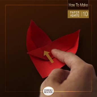 Next, fold over the top fold of the right side.